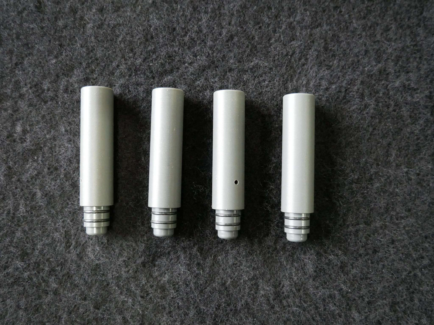 Lieferumfang DFS-G- Verlängerung für Landegestelle: 8x O-Ringe, 4x Verlängerungen (Rot/Grau)