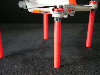 Montierte DFS-G- Verlängerungen für Landegestelle (rot) an der DJI Mavic Mini Drohne. Nähere Ansicht