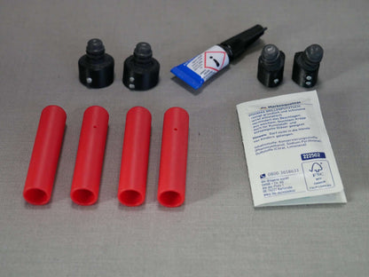 Lieferumfang Landegestell System rot: 4x Adapter, 4x Landefüße, 1x Reinigungstuch, 1 Tube Kleber