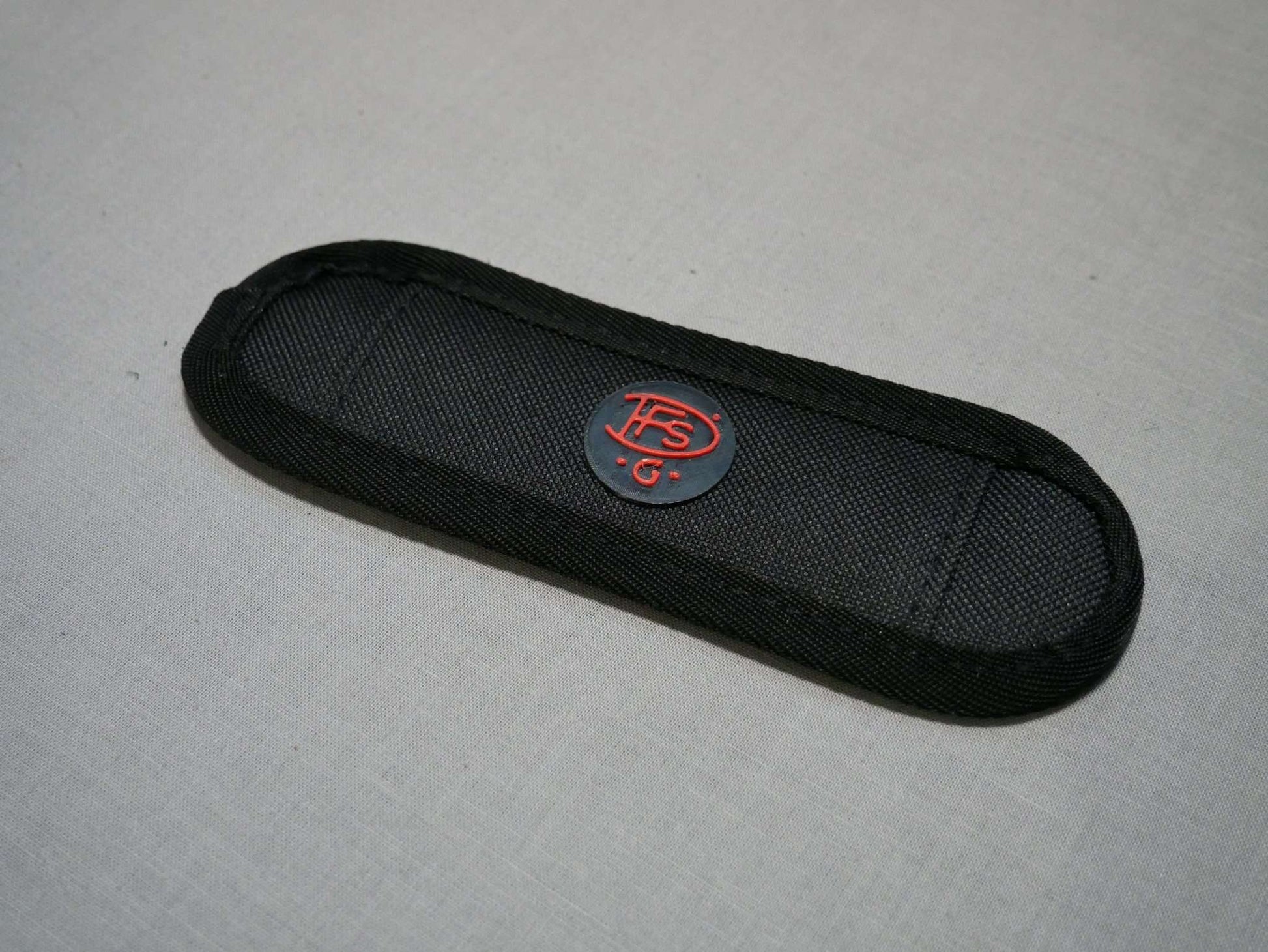 Polster zum Halter mit Halsgurt mit DFS-G- Logo aus hochwertigem Nylon gefertigt